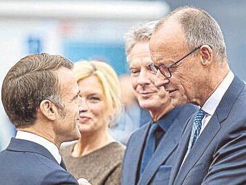 Frankreichs Präsident Macron (links) war Ehrengast bei der Einheitsfeier in Saarbrücken.