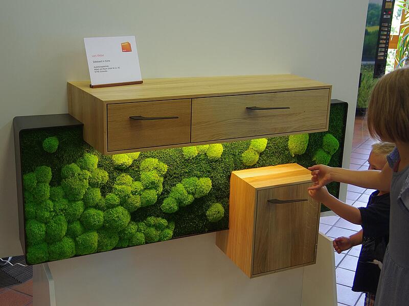 Ein Werkstück mit Mooswand