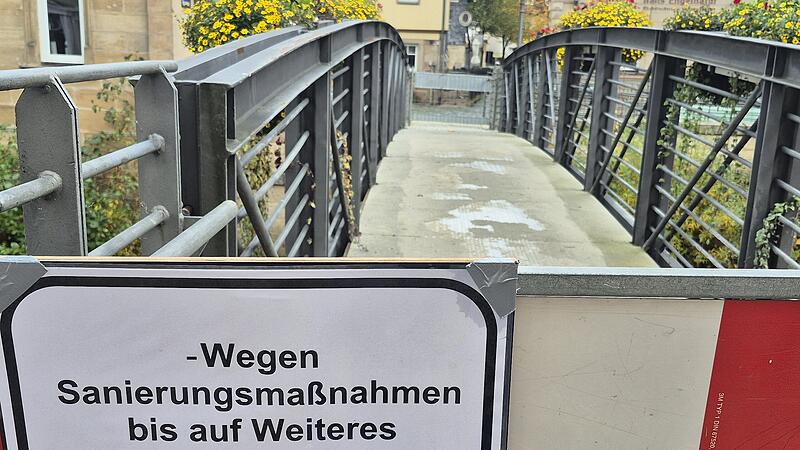 Der "Eiserne Steg", der über die Haßlach führt, ist vorläufig gesperrt. Grund sind Mängel am Tragwerk. Der "Eiserne Steg", der über die Haßlach führt, ist vorläufig gesperrt. Grund sind Mängel am Tragwerk.