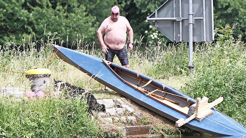 Zwischenstopp an der Staustufe in Limbach: Da darf sich auch sein st&auml;ndiger Begleiter, das Kajak, wie der Schwimmer Mathias Alt selbst eine Pause im Trockenen g&ouml;nnen.