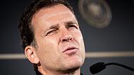 Augen zu und durch: DFB-Direktor Oliver Bierhoff muss sich auf der Suche nach einem Löw-Nachfolger durch eine lange Kandidaten-Liste kämpfen.