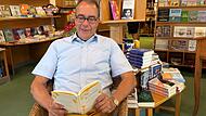 Poetenfest Lesen macht glücklich: Buchhändler Christian Schmidt aus Adelsdorf unterstützt das Erlanger Poetenfest.