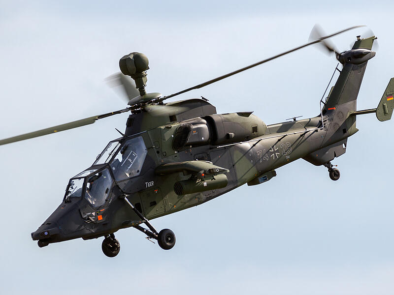 German Army Eurocopter EC665 Tiger attack helicopter flyby during the Berlin Airshow ILA at Berlin-Schoneveld airport. BERLIN - JUN 2, 2016.
