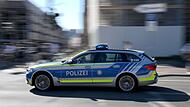 Polizeiauto mit Blaulicht in M&uuml;nchen