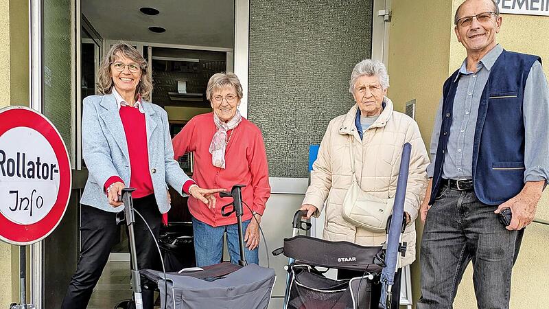 Seniorenbeauftragter Edgar Kast und Theresia Schodorf-Friedrich (links) sowie G&auml;ste mit Rollator.