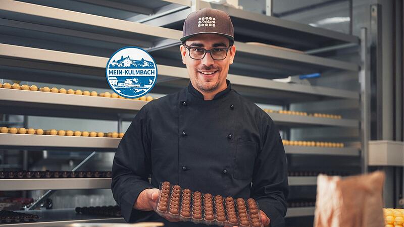 Peter-Alexander Pelz pr&auml;sentiert hier ein Tablett Pralinen. Seit 2008 leitet er als Inhaber die Gesch&auml;fte der Confiserie Esther