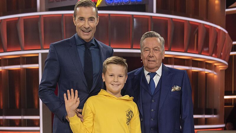 Der neunjährige Robert tritt am Samstag bei „Klein gegen Groß“ gegen Roland Kaiser (rechts) an. Moderiert wird die Sendung in der ARD von Kai Pflaume.