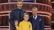 Der neunjährige Robert tritt am Samstag bei „Klein gegen Groß“ gegen Roland Kaiser (rechts) an. Moderiert wird die Sendung in der ARD von Kai Pflaume.