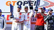 Christopher Haase (Mitte) und Simon Reicher (links) feierten in Frankreich ihren dritten Saisonsieg in der GT-Open-Rennserie. Christopher Haase (Mitte) und Simon Reicher (links) feierten in Frankreich ihren dritten Saisonsieg in der GT-Open-Rennserie.