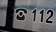 Die Notrufnummer 112 steht auf einem Krankenwagen Die Notrufnummer 112 steht auf einem Krankenwagen