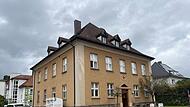 Das BRK will in der Flessastraße eine Kita bauen und dafür das alte Verwaltungsgebäude abreißen – und das sorgt für Kritik.