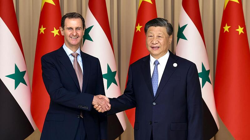 Chinas Pr&auml;sident Xi Jinping und Bashar al-Assad, Pr&auml;sident von Syrien, bei ihrem bilateralen Treffen