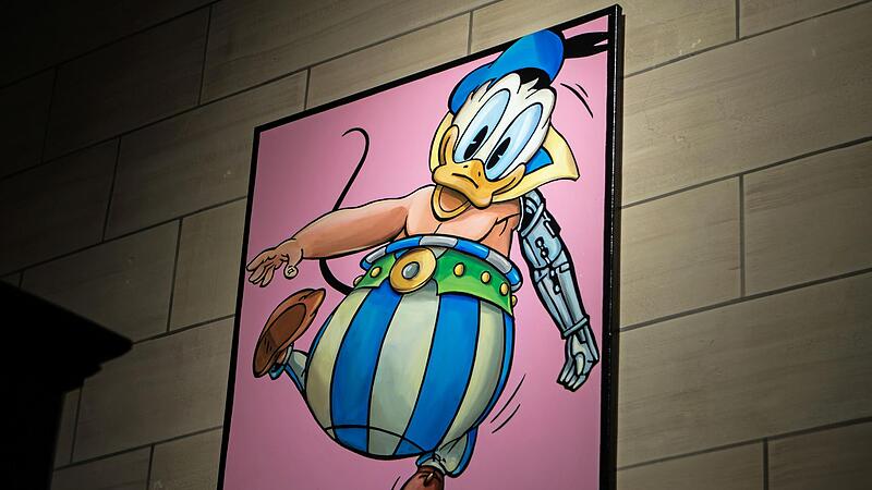 Der N&uuml;rnberger K&uuml;nstler Johannes H&auml;fner kombiniert in Gem&auml;lden verschiedene Comic-Figuren &ndash; darunter Obelix und Donald Duck.