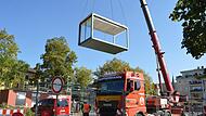 In absehbarer Zeit werden Mitarbeiterinnen und Mitarbeiter der Postbank vom Postamt in der M&uuml;nchner Stra&szlig;e in Container auf dem Salinenparkplatz in Bad Kissingen umziehen.
