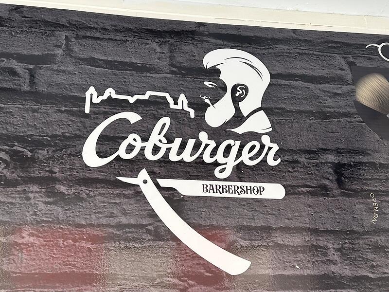 Der &bdquo;Coburger Barbershop&ldquo; in der Rosengasse hat die Veste ebenfalls in sein Logo aufgenommen.
