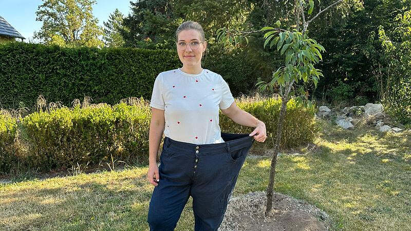 Bis auf die Hose von damals erinnert nichts mehr an Paula Kastls damalige Erkrankung: Adipositas. Die junge Frau aus Neunkirchen, die heute in Baiersdorf lebt, will nun anderen Mut machen.