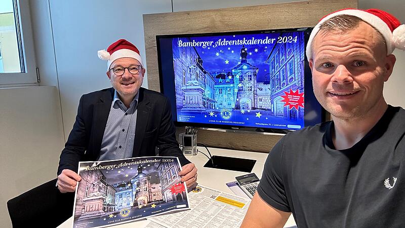 Zwei Lions von 36: Frank Geppert und Johannes Spies pr&auml;sentieren den 17. Bamberger Adventskalender. Der Verkauf  startet am 11.11.