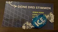 Wahlwerbung von Robin Kuhn mit ICE-Bonbon Robin Kuhn will in den Bad Kissinger Stadtrat für die CSU. Sein Wahlgeschenk - ein ICE-Bonbon - stieß einigen auf. Sie fühlen sich an die amerikanische Ausländerbehörde I.C.E. erinnert.
