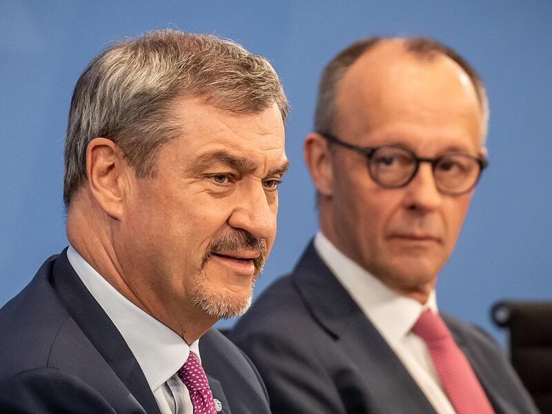 Markus S&ouml;der (CSU) und Kanzler Friedrich Merz (CDU) (Archivbild)