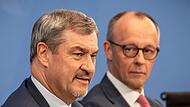 Markus S&ouml;der (CSU) und Kanzler Friedrich Merz (CDU) (Archivbild)