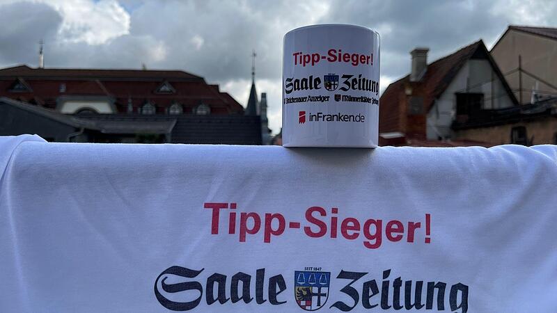 Ein Tippsieger-T-Shirt oder eine Tasse warten auf den Gewinner des Spieltags.