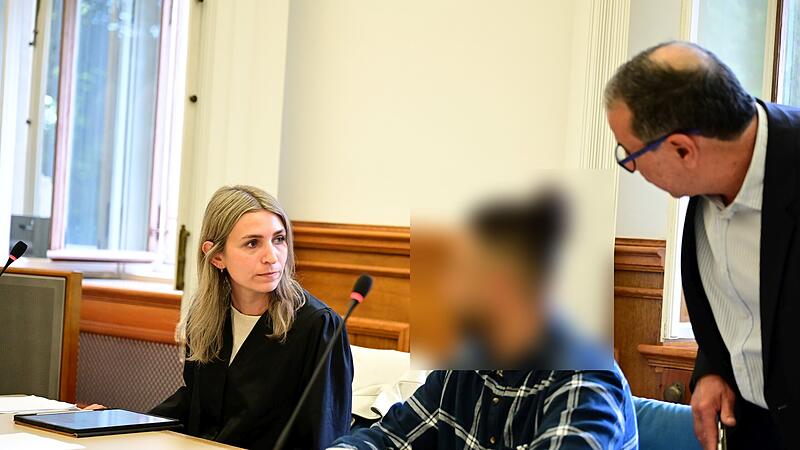 Rechtsanwältin Carolin Redai aus Bamberg, der Angeklagte und ein Dolmetscher