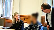 Rechtsanwältin Carolin Redai aus Bamberg, der Angeklagte und ein Dolmetscher