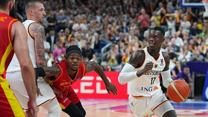 Der überragende Montenegriner, Kendrick Perry (hinten) bleibt am Block von Daniel Theis hängen, so dass Dennis Schröder (rechts)  zum Korb zeihen kann.