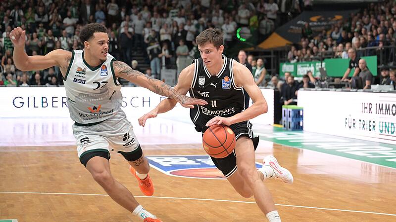 Mit seinen Dreiern sorgte Richard Balint (rechts) dafür, dass es Bamberg in Trier noch in die Verlängerung schaffte. Mit seinen Dreiern sorgte Richard Balint (rechts) dafür, dass es Bamberg in Trier noch in die Verlängerung schaffte.