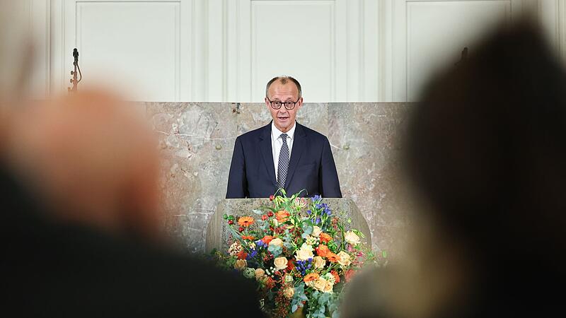 Merz bei der Gedenkfeier für den Bankier Friedrich von Metzler