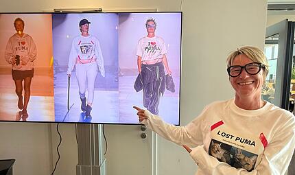 In der Puma-Kantine in Herzogenaurach k&ouml;nnen alle Mitarbeiter Simone Hoyer bei ihrem gro&szlig;en Auftritt bewundern: Die Puma-Managerin pr&auml;sentierte bei der Fashion Week in Paris die Kollektion des Labels Doublet.