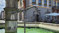 Sprenglersbrunnen Coburg - Trinkwasserbrunnen Am Sprenglersbrunnen am Marktplatz fließt frisches Trinkwasser.