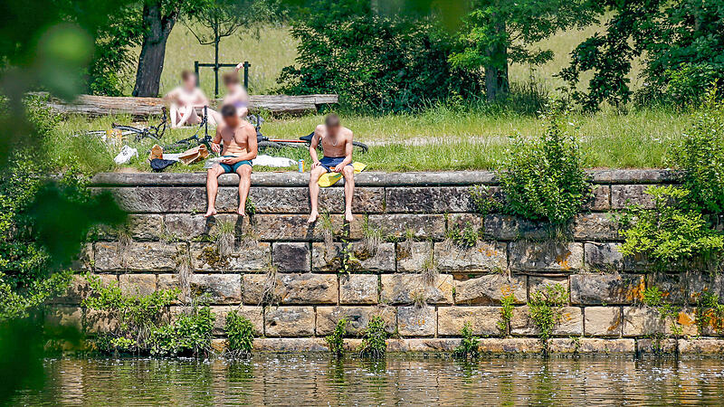 Einer der begehrtesten Plätze an der Sonne liegt in Bamberg an der Kaimauer des Alten Kanals gegenüber der Buger Spitze. Nun soll hier das Baden legalisiert werden.