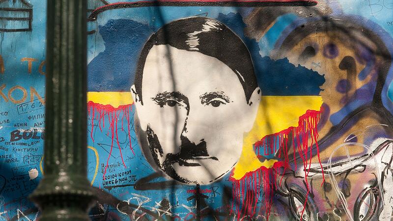 Putin-Darstellung als Hitler Putin-Darstellung als Hitler