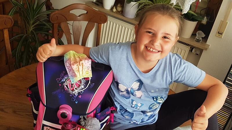 Die achtjährige Hannah Kraus kann es kaum erwarten. Nach den Pfingstferien kehrt in die Bildungseinrichtungen ein großes Stück Normalität zurück. So soll der Schulstart klappen.Forchheim & Fränkische Schweiz
