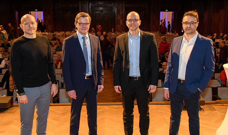 Podiumsdiskussion Bad Kissingen: Moderator Karl Kovacs, Andr&eacute; Kiesel, Dirk Vogel und Moderator Benedikt Borst