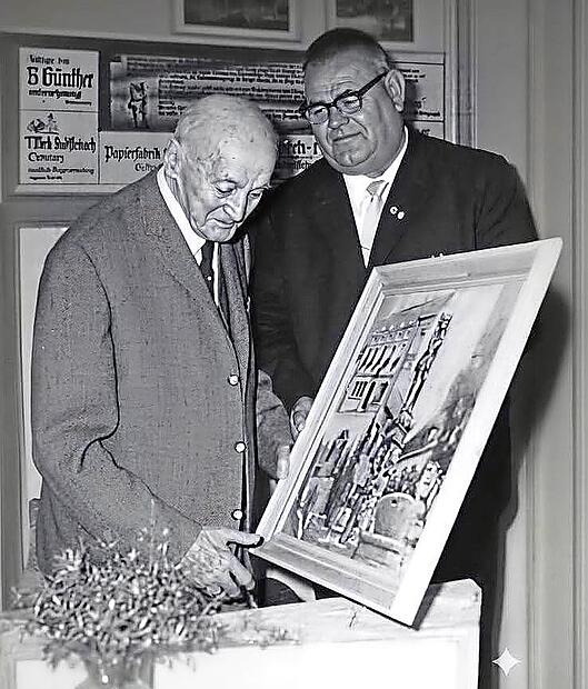 Der Ehrenb&uuml;rger Hans Bauerschmidt aus Stadtsteinach erhielt anl&auml;sslich seines 90. Geburtstags im Jahre 1966 aus den H&auml;nden des damaligen B&uuml;rgermeisters Egid Kotschenreuther ein &Ouml;lgem&auml;lde mit Ansichten von Stadtsteinach. Auch sein Elternhaus am Mar...