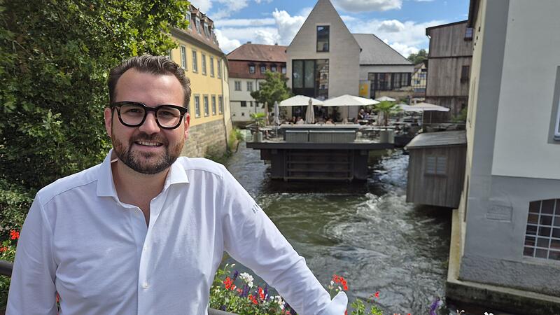 Maximilian Beughold vor seinem Henrii im Zentrum des Bamberger Welterbes.
