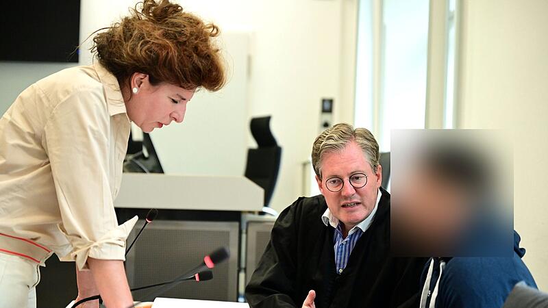 Landgericht Bamberg Schlägerei Rumänische Bauarbeiter Strullendorf Messer Eine Rumänisch-Dolmetscherin, Rechtsanwalt Moritz Schmitt-Fricke aus Mainz und einer der Angeklagten