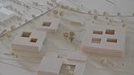 Unser Bild  zeigt das Modell der Architekten Numrich Albrecht Klumpp (Berlin) zum Schulzentrum Hammelburg.  Im Bild links oben die Förderschule und unten die Realschule, sowie rechts oben das Gymnasium und unten Sporthalle/Mensa.