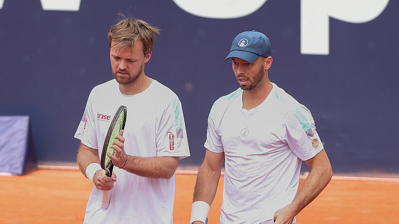 Konsternierte Stimmung: Kevin Krawietz (l.) und Tim P&uuml;tz sind bei den BMW Open in M&uuml;nchen bereits in der ersten Runde ausgeschieden.
