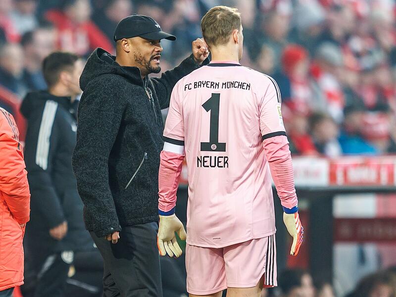 Vincent Kompany und Manuel Neuer (r)