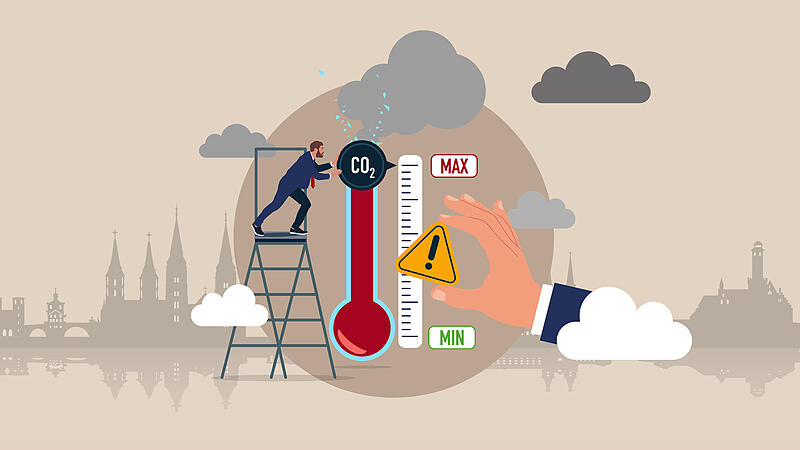Das Bild zeigt eine Thermometer, an dessen Spitze ein CO-2 Symbol befestigt ist. Ein Mann h&auml;lt das Symbol fest.