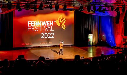 Das Fernweh Festival in Erlangen im Jahr 2022. Die Veranstaltung macht mit Vortr&auml;gen und Messe Lust auf Outdoor und Reisen.