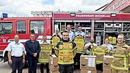 Erster Bürgermeister Jochen Weber (links) und Vertreter der Feuerwehr Michelau. Erster Bürgermeister Jochen Weber (links) und Vertreter der Feuerwehr Michelau.