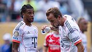 Michael Olise (l) und Harry Kane Michael Olise (l) und Harry Kane