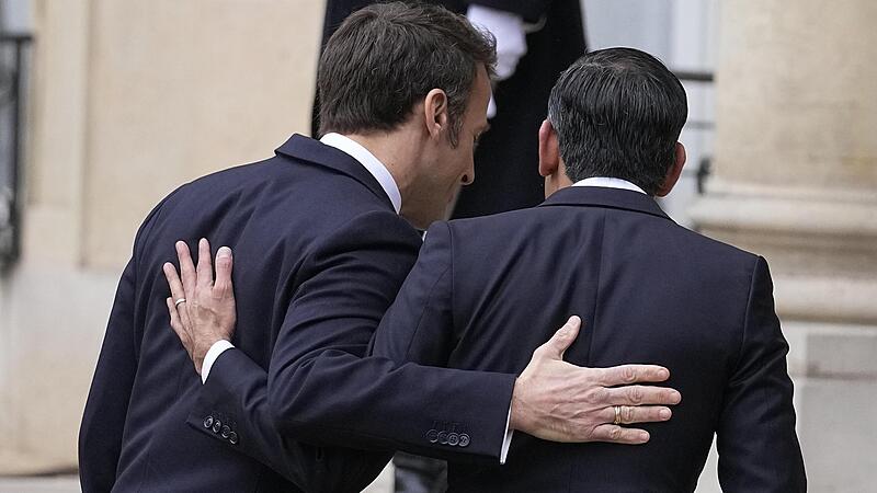 Der franz&ouml;sische Pr&auml;sident Emmanuel Macron (links) und der britische Premier Rishi Sunak