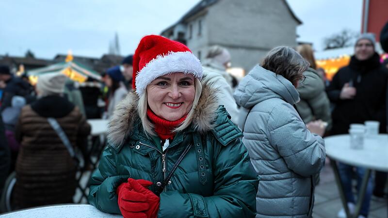 Strahlender Weihnachtsmarkt - strahlende Gesichter.