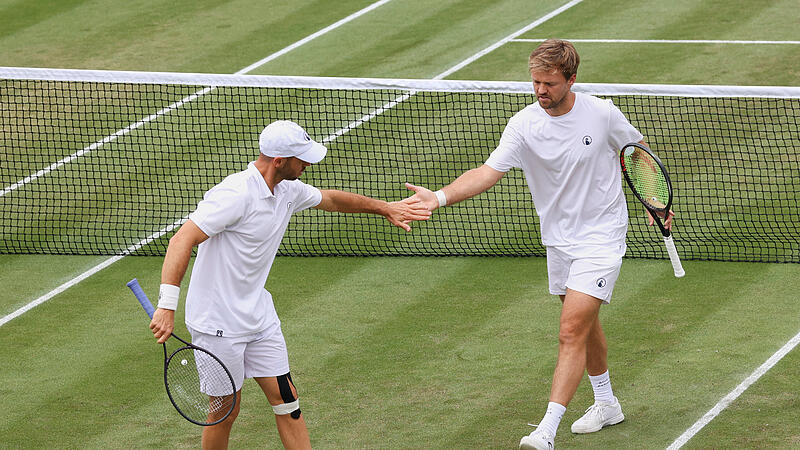 Kevin Krawietz (r.) und Tim Pütz stehen in Wimbledon in der zweiten Runde.